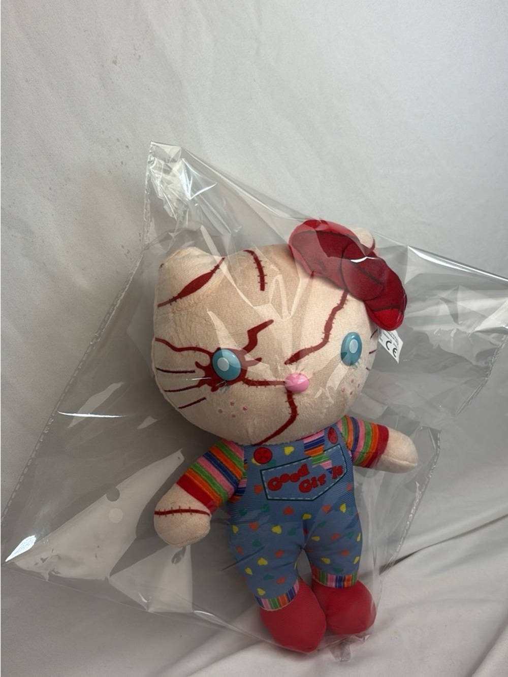 Plush Cat Doll in Cream & Red Overalls
